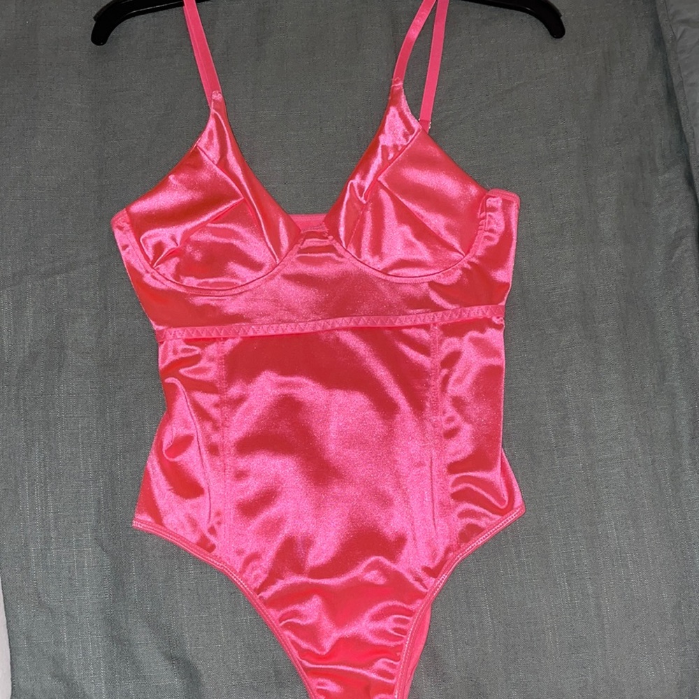 Hot pink body suit